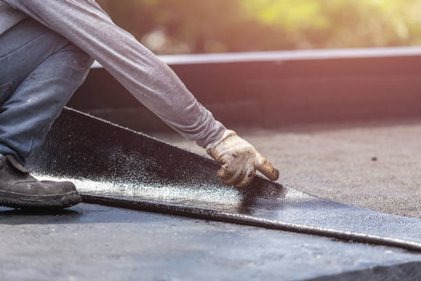 Professional Waterproofing technician working in Whitewater, WI
